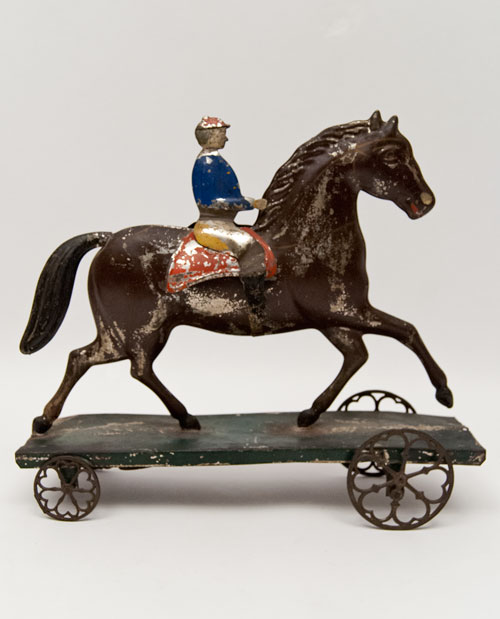 antique riding horse on wheels