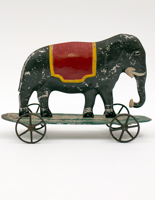 Early American Antique Painted Tin Toy Elephant on Base with Wheels Early American Antique Painted Tin Toy Elephant on Base with Wheels