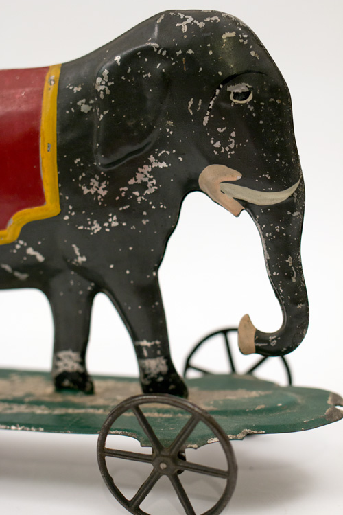 Early American Antique Painted Tin Toy Elephant on Base with Wheels Early American Antique Painted Tin Toy Elephant on Base with Wheels