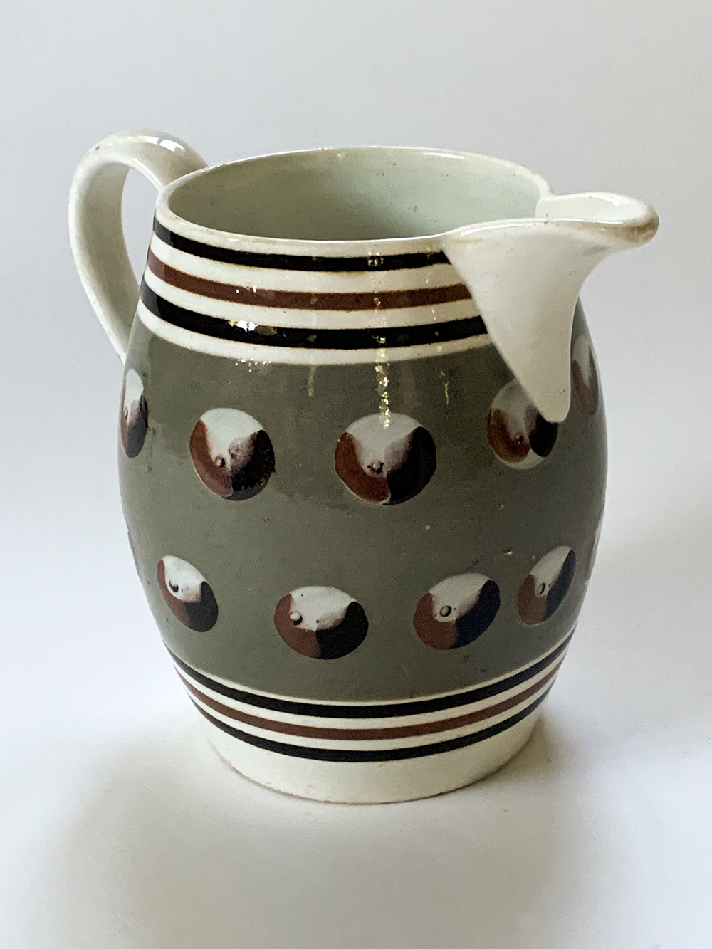 early 19th century slip decorated mochaware pitcher