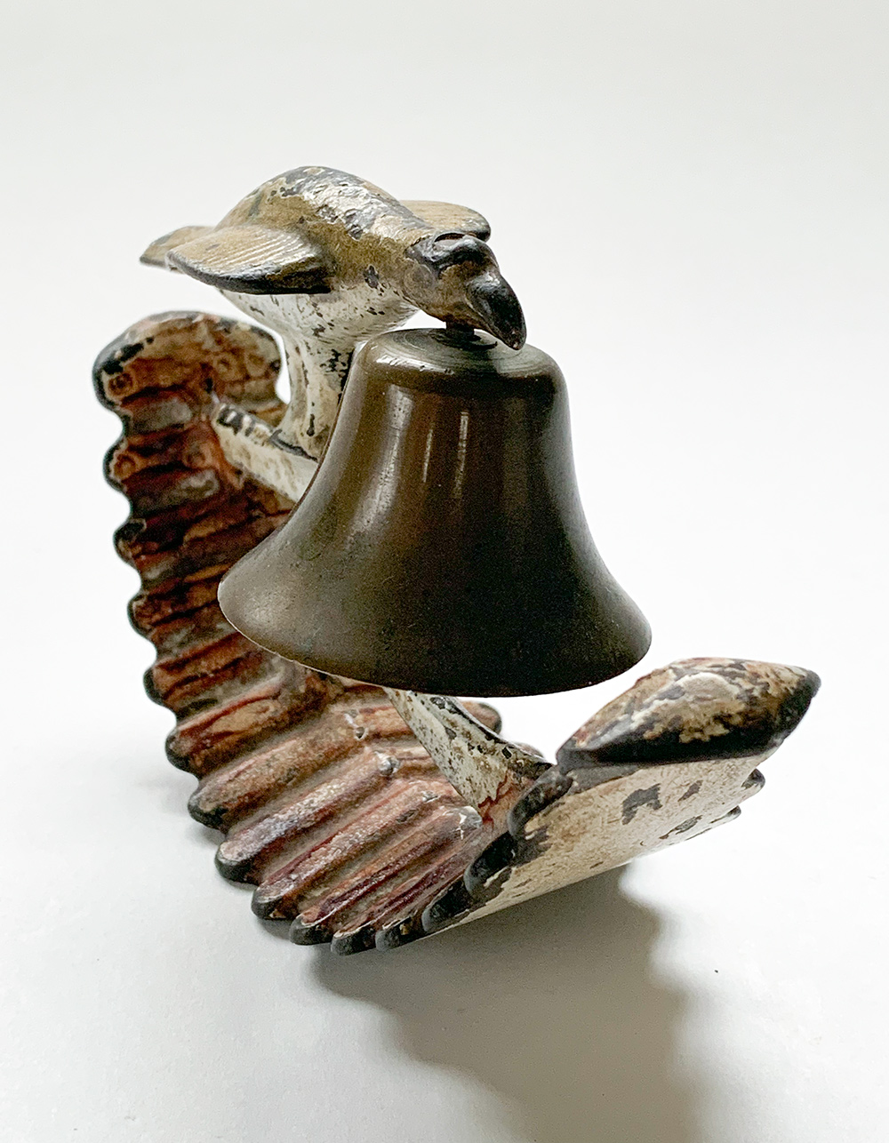 original cast iron patriotic rocking eagle bell toy for sale