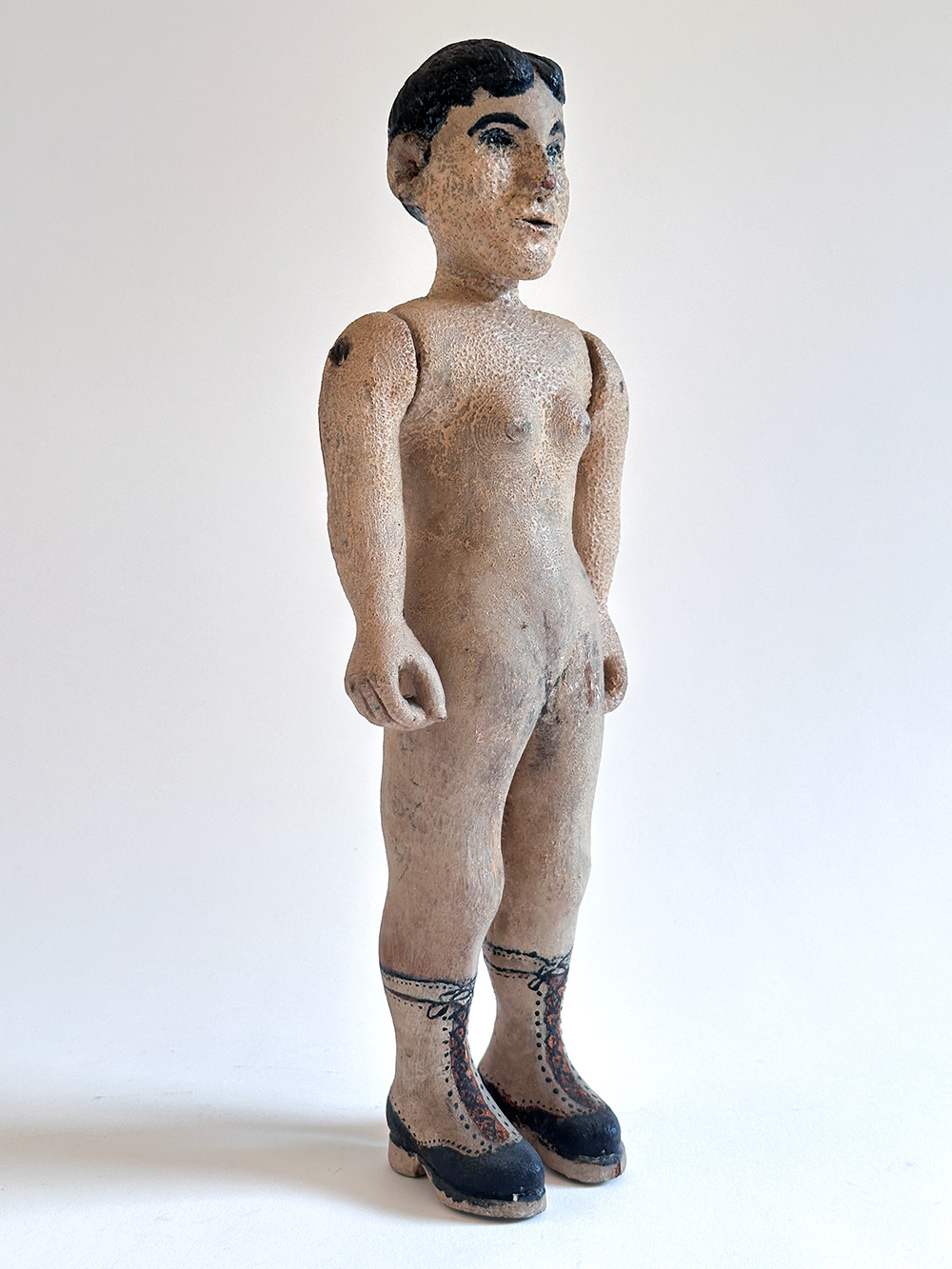 paint decorated wooden folk art carving of nude woman in boots
