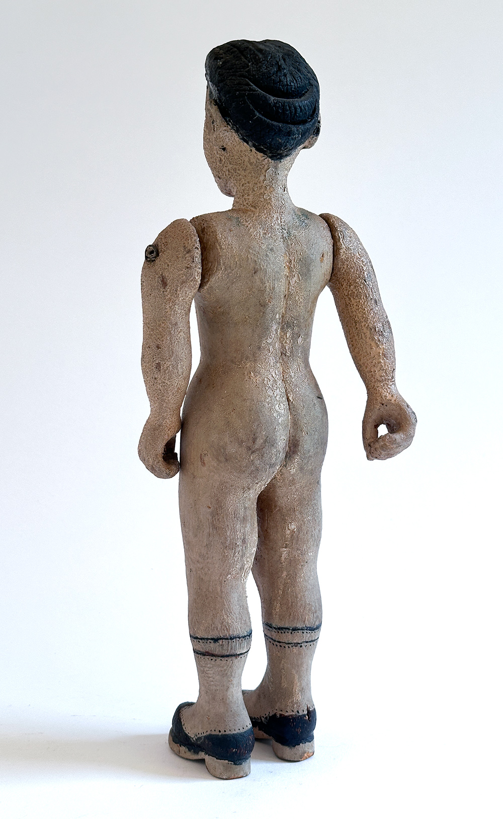 paint decorated wooden folk art carving of nude woman in boots