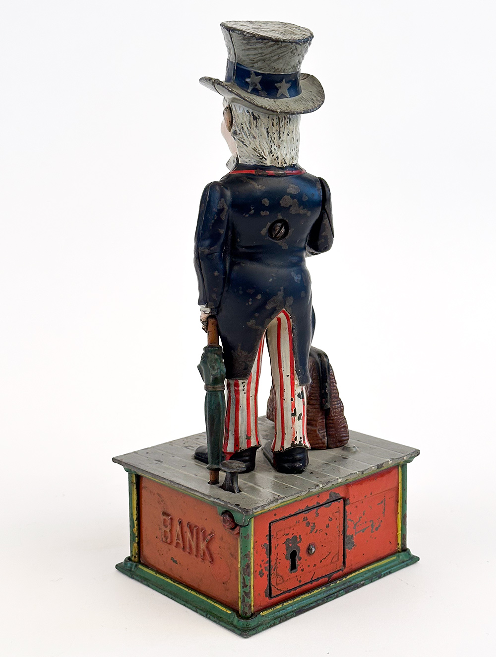 1886 antique uncle sam cast iron mechanical bank