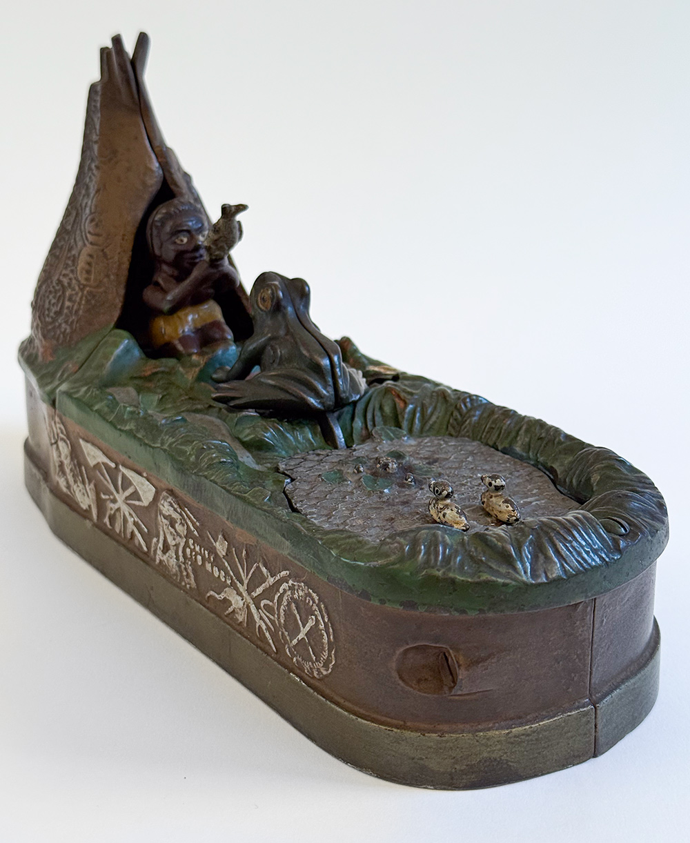 original cast iron chief big moon mechanical bank