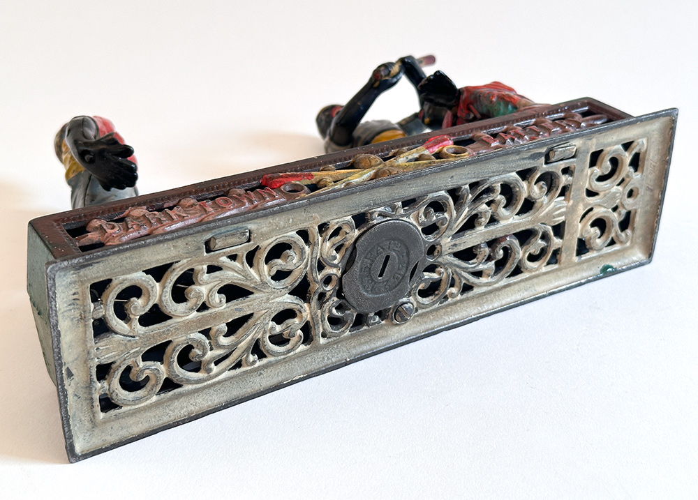 original j and e stevens cast iron Darktown Battery mechanical bank