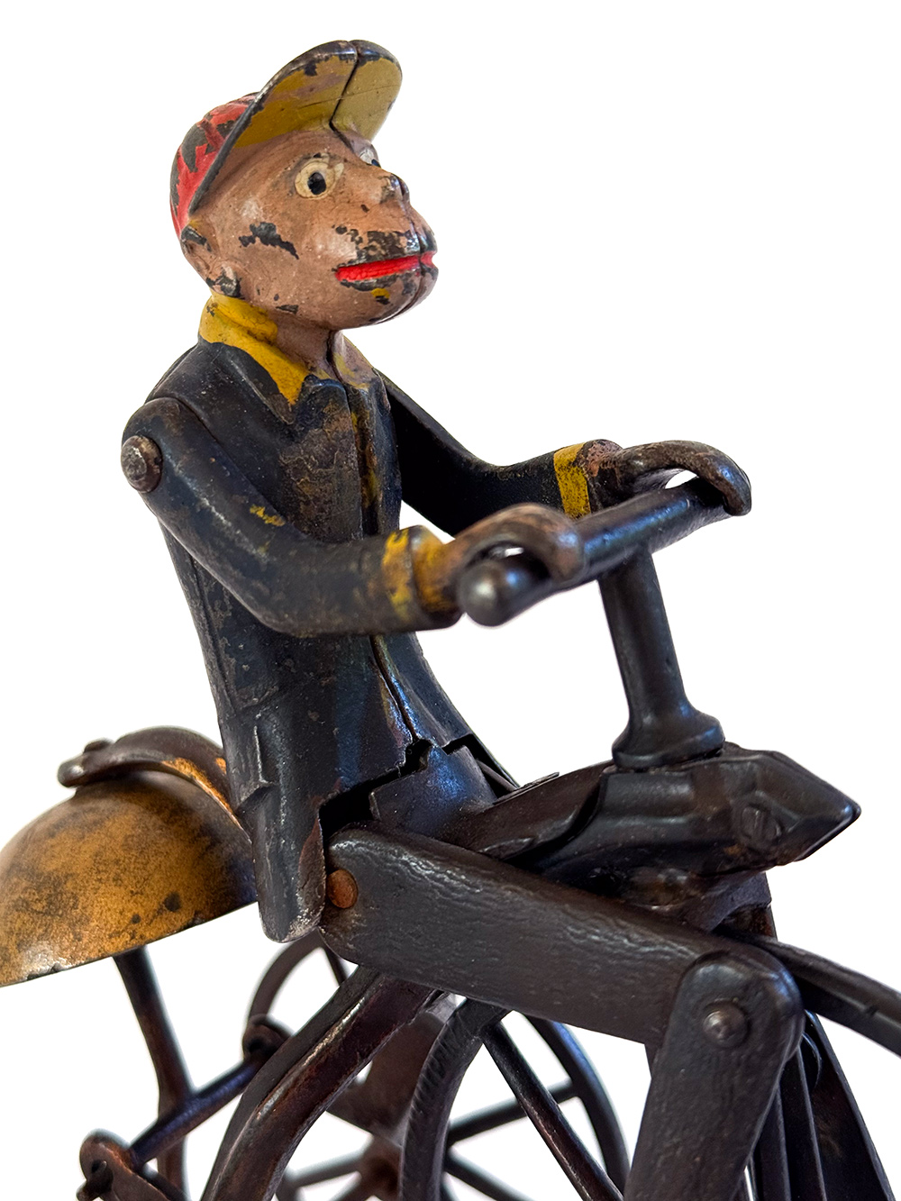 original j and e stevens cast iron deluxe painted and japanned monkey on tricycle bell toy