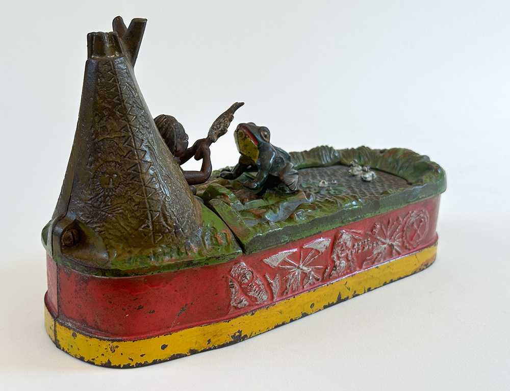original cast iron chief big moon mechanical bank with scarce red base