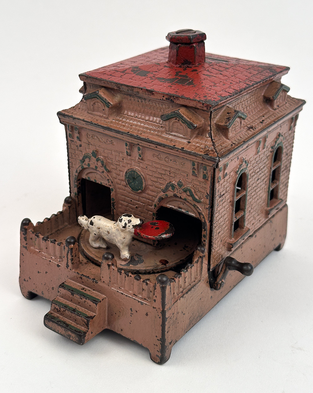 original cast iron dog on turntable mechanical bank