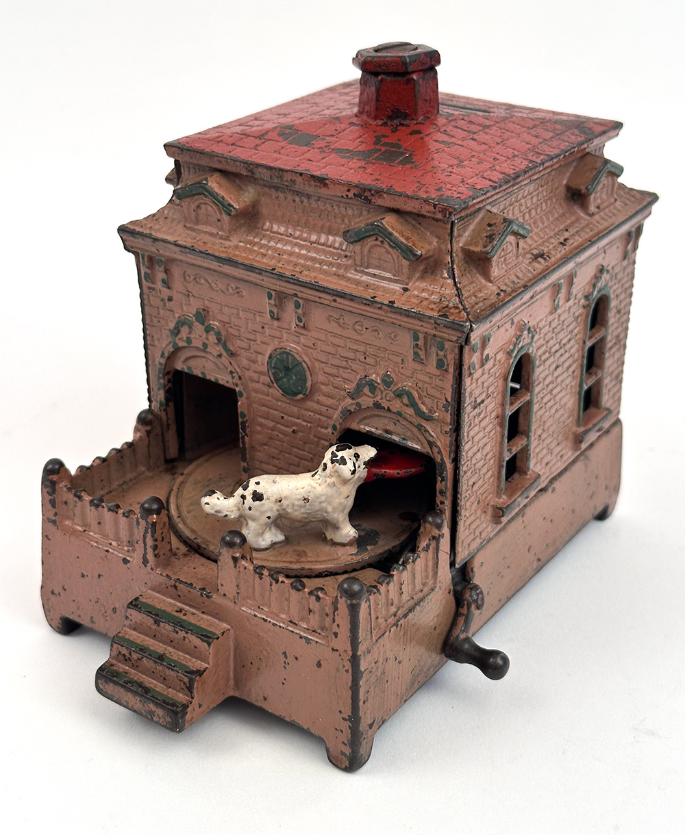 original cast iron dog on turntable mechanical bank