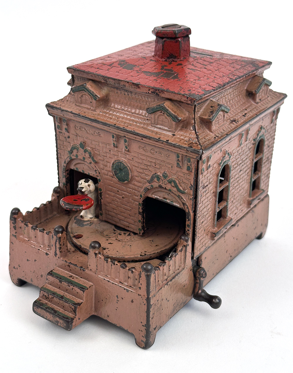 original cast iron dog on turntable mechanical bank