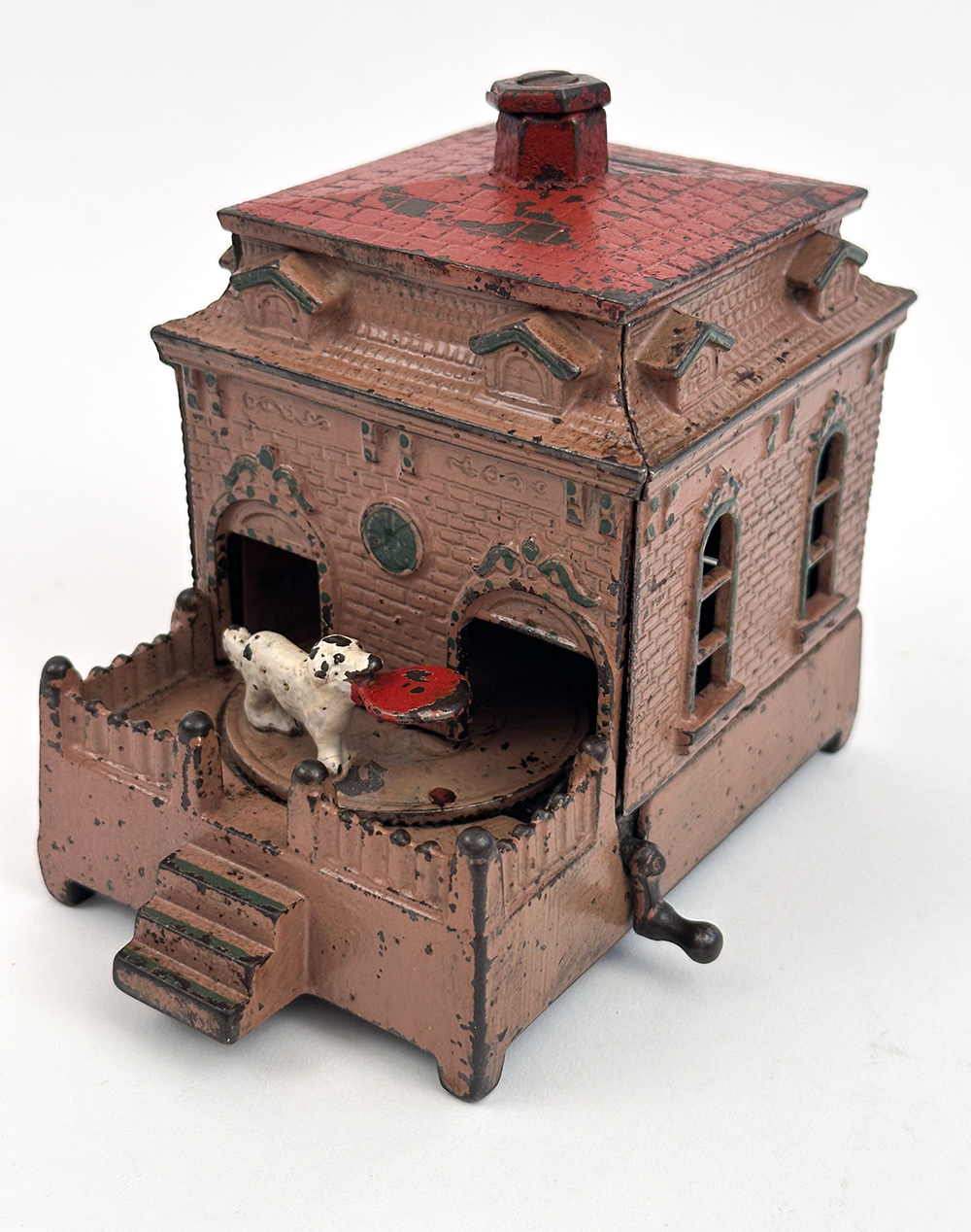 original cast iron dog on turntable mechanical bank