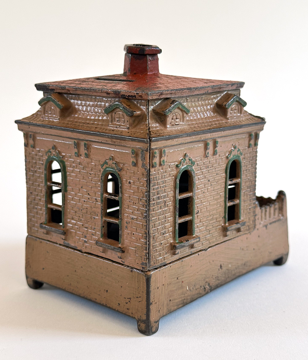 original cast iron dog on turntable mechanical bank