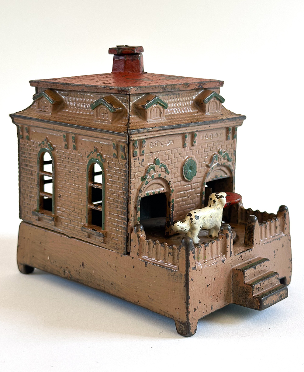original cast iron dog on turntable mechanical bank