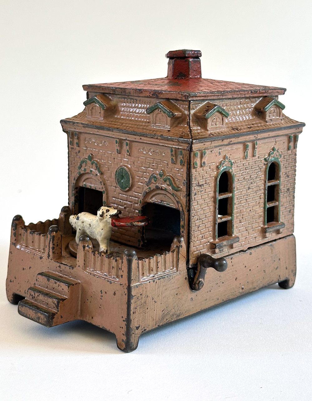 original cast iron dog on turntable mechanical bank