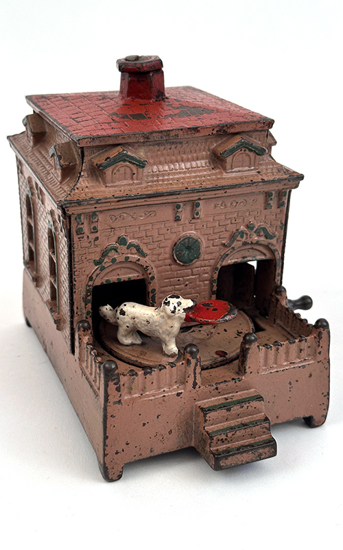 1895 original antique cast iron dog on turntable mechanical bank