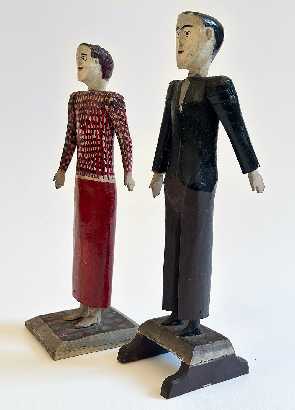 antique wooden original paint decorated carvings of a couple with articulated arms