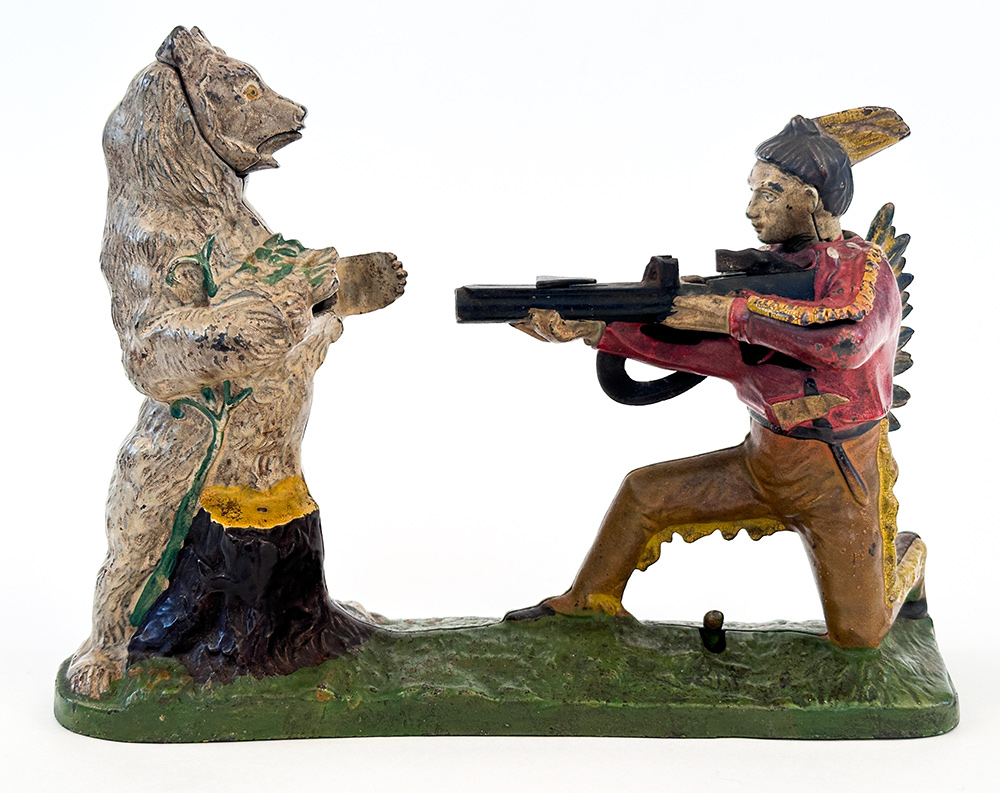 cast iron indian shooting bear mechanical bank with rare white bear