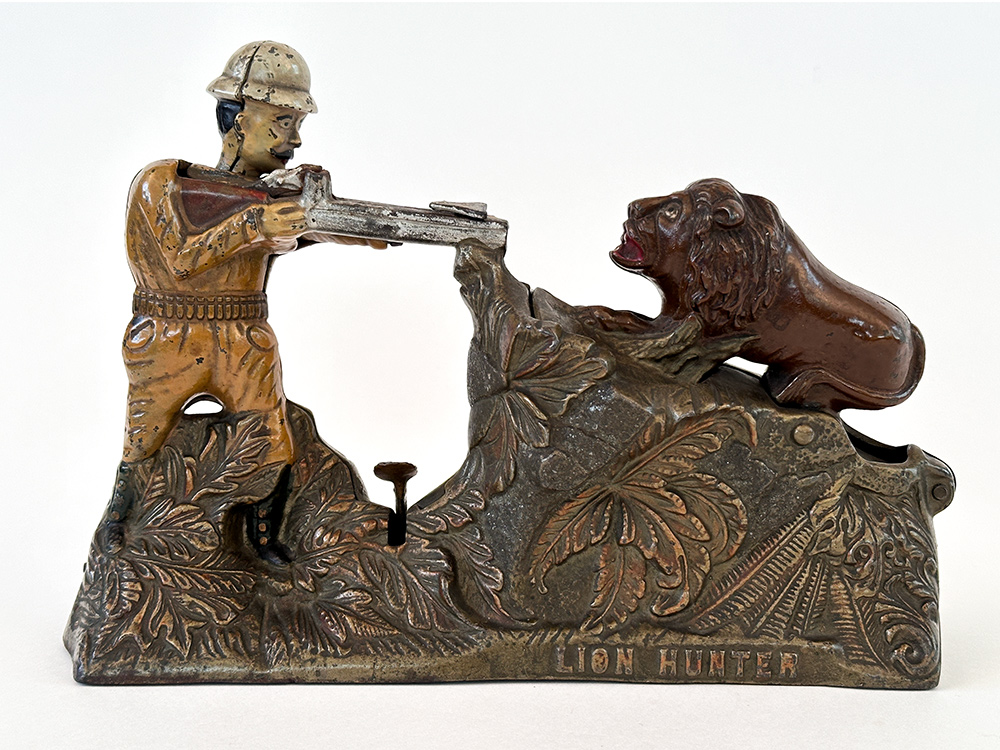 rare lion hunter cast iron mechanical bank