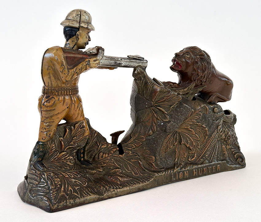 rare lion hunter cast iron mechanical bank