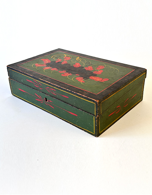 early 19th century wooden paint decorated document box in green, red, yellow and black