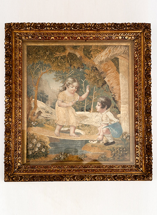 1820s english pictorial needlework of two children crossing a stream