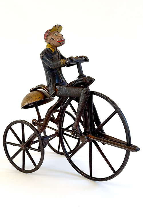 1883 J Stevens Monkey Riding Velocipede painted cast iron bell toy