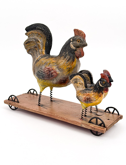 antique three rooters on wooden platform pull toy with cast iron wheels and spring legs detailed painting