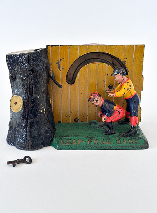 original antique painted cast iron mechanical leap-frog bank for sale