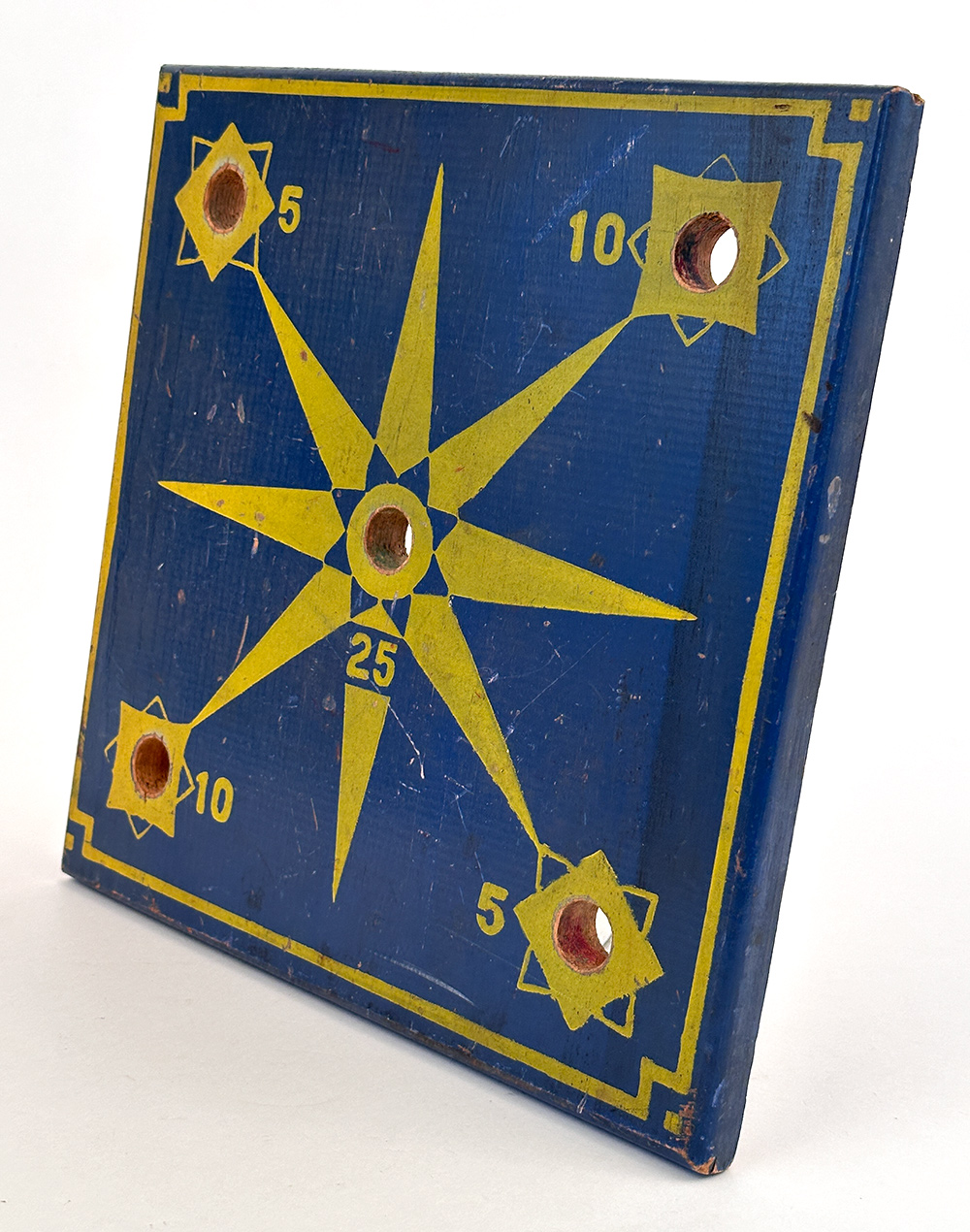 antique blue yellow paint decorated ring toss gameboard