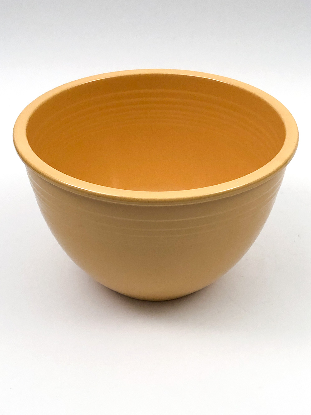 side view Number 7 orignal yellow vintage fiesta nesting bowl