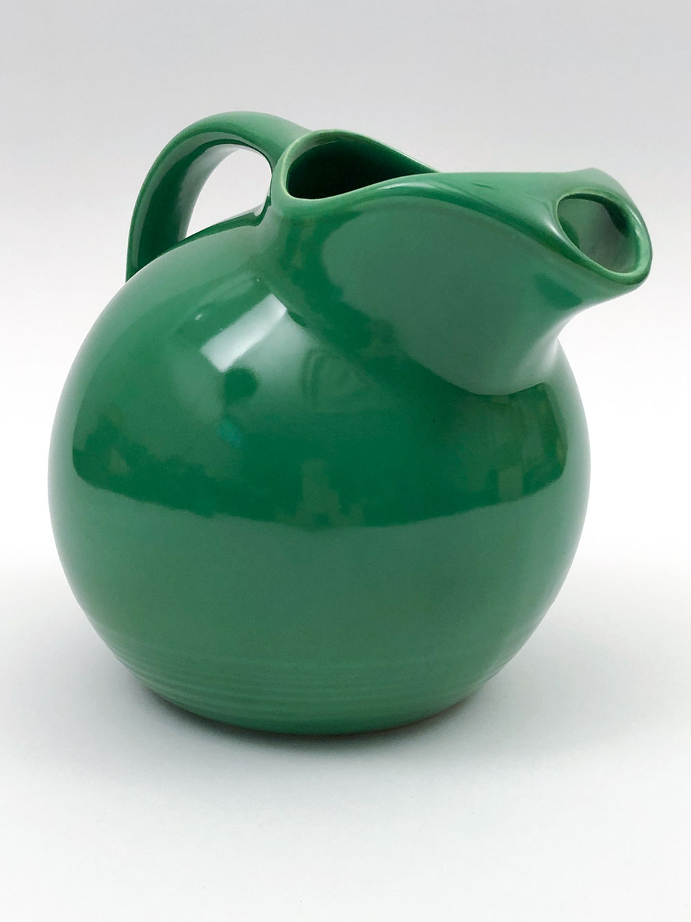 rare medium green harlequin water pitcher